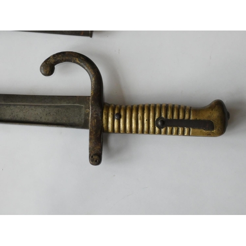 A French Chassport bayonet with brass handle and steel