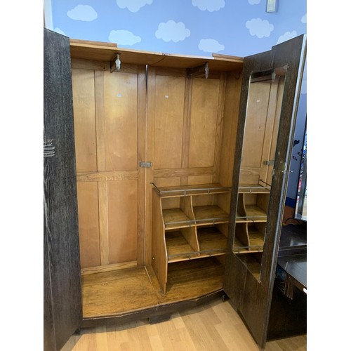 A Camphor oak double wardrobe, c.1930's, with fitted interior W