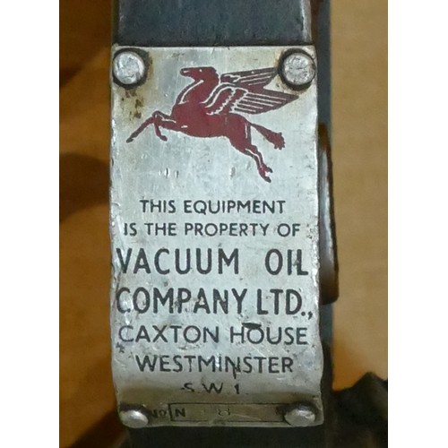 90 - A Vacuum Oil Company Ltd hand pump, together with other oil seals, clamps and chains