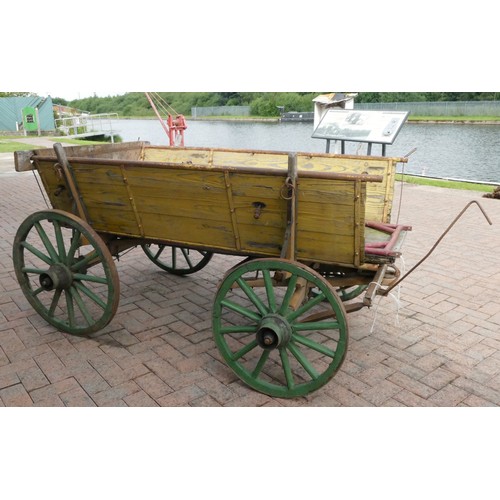 111 - A large wooden cart carriage, with wooden wheels