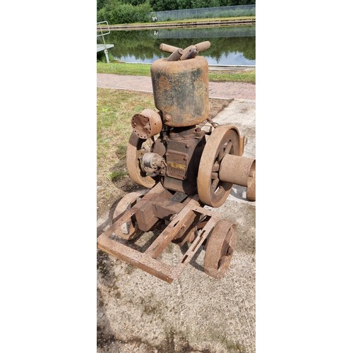 124 - A Lister Type A Spec 15 2 1/2hp stationary engine, number 51876, mounted on wheels.
Supplied to Coll... 