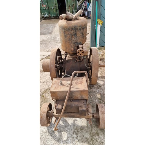 124 - A Lister Type A Spec 15 2 1/2hp stationary engine, number 51876, mounted on wheels.
Supplied to Coll... 