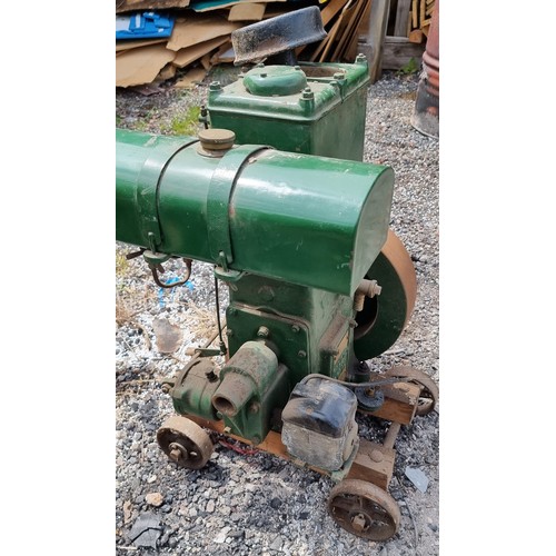 136 - A Lister D309 spec 13D stationary engine, number 106406, 1.5hp, mounted on wheels