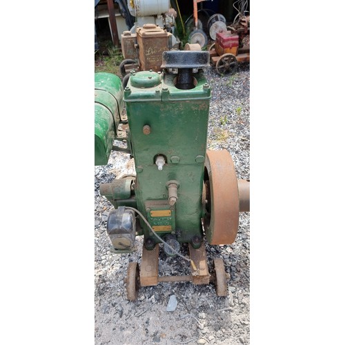 136 - A Lister D309 spec 13D stationary engine, number 106406, 1.5hp, mounted on wheels