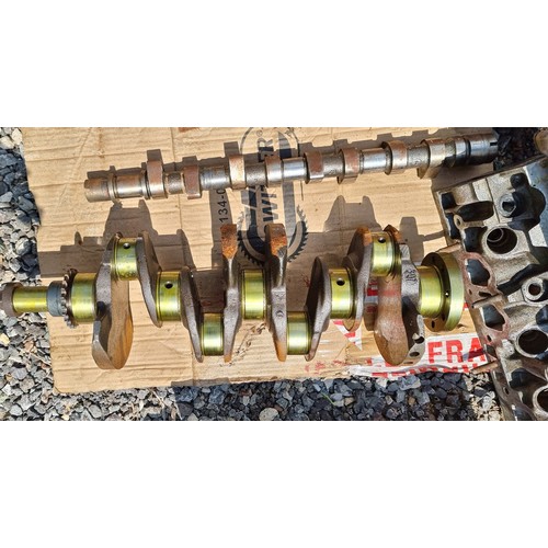 148 - A Peugeot 205 1.6 and 1.9 GTi, engine parts, to include manifold, down pipes, 1.9 camshaft