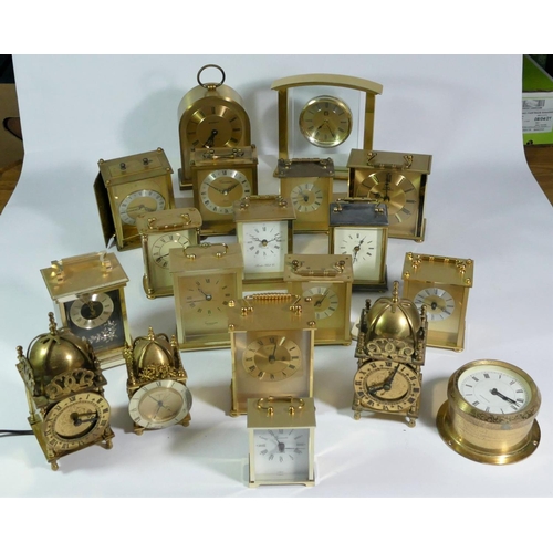 A collection of clocks to include three lantern clock a Seiko