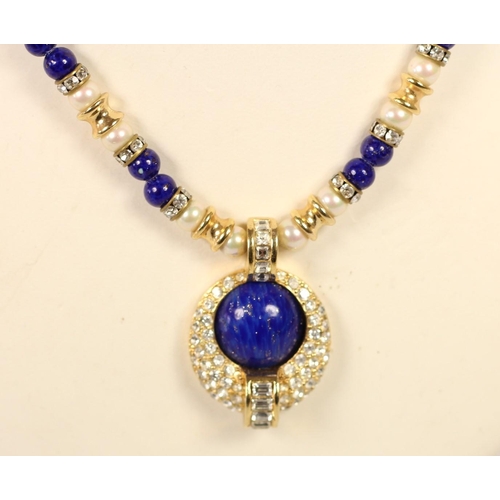 69 - Christian Dior, a Revelie faux lapis lazuli, pearl, sapphire, diamond and gold necklace/pendant with... 