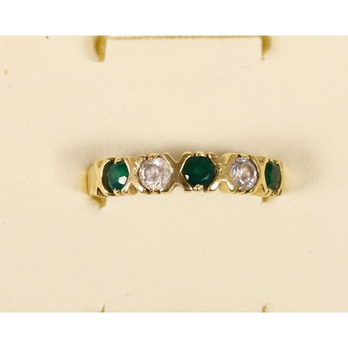 73 - A French 14ct gold emerald and white stone five stone ring, set with brilliant cut stones, bearing c... 