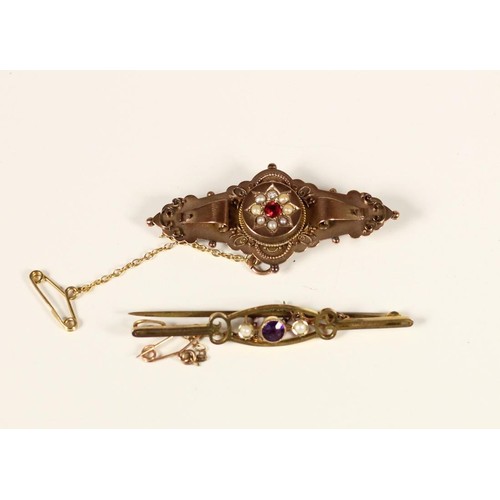 79 - An Edwardian 9ct rose gold panel brooch, Birmingham 1905, set with a red paste and half pearl cluste... 