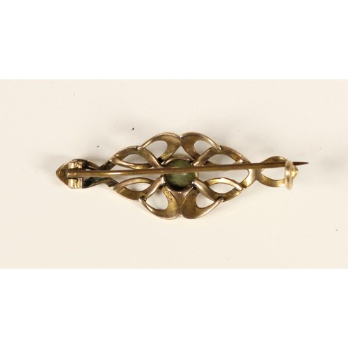 80 - An Art Nouveau rose gold and peridot scroll brooch, unmarked and a Victorian 9ct gold red paste and ... 