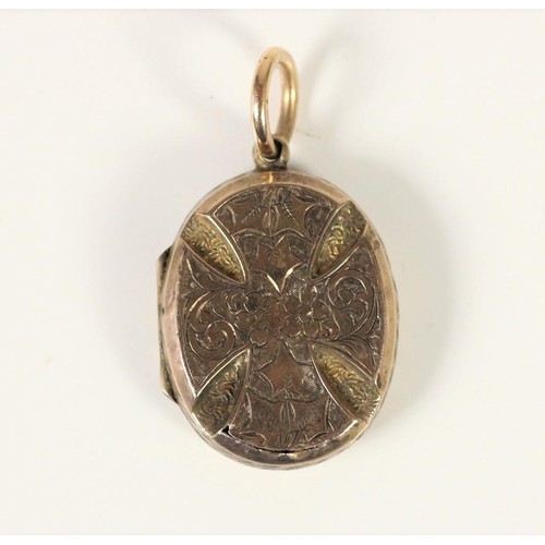 84 - A Victorian gold locket with engraved and embossed cross motif, 25 x 20mm, 5.2 gm