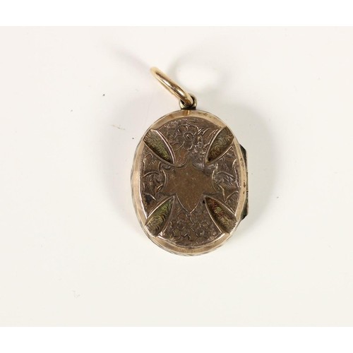 84 - A Victorian gold locket with engraved and embossed cross motif, 25 x 20mm, 5.2 gm