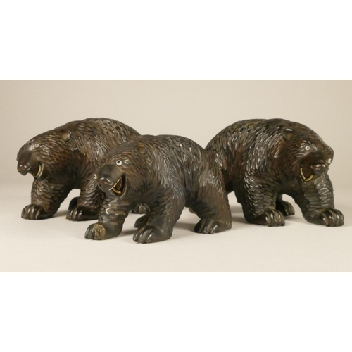 165 - Three Black Forest soft wood bears, comprising of two adults and a cub (3)