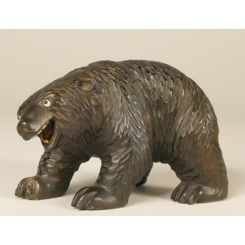 165 - Three Black Forest soft wood bears, comprising of two adults and a cub (3)