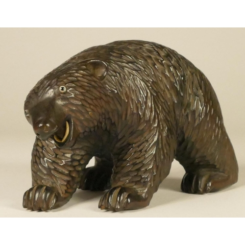 165 - Three Black Forest soft wood bears, comprising of two adults and a cub (3)