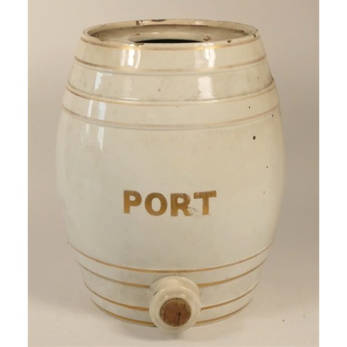 180 - An early 20th century pottery PORT dispenser in the shape of a barrel, no lid or tap