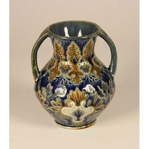 181 - A Doulton Lambert two handled vase, in a cobalt blue, gold and white floral detailing, stamped to ba... 