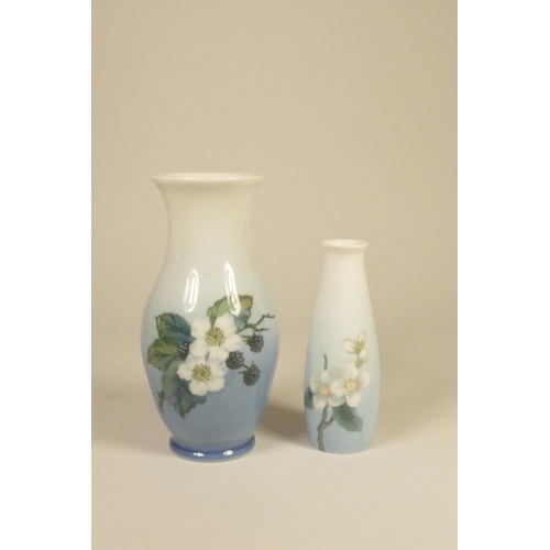 185 - Two porcelain Royal Copenhagen vases, white and blue body with painted flowers with blackberries, st... 