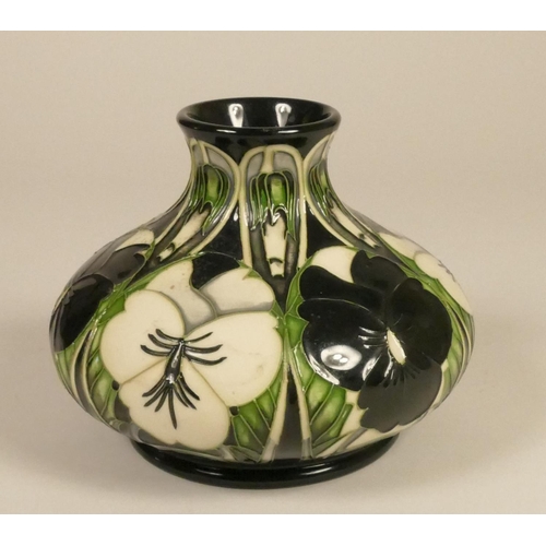 186 - A Moorcroft green, white and black vase, with flower detail, stamped to base and dated 2003 13 cm