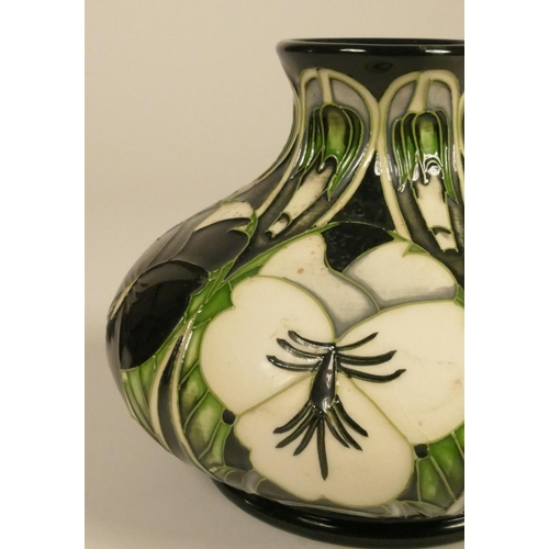 186 - A Moorcroft green, white and black vase, with flower detail, stamped to base and dated 2003 13 cm