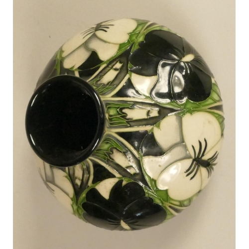 186 - A Moorcroft green, white and black vase, with flower detail, stamped to base and dated 2003 13 cm