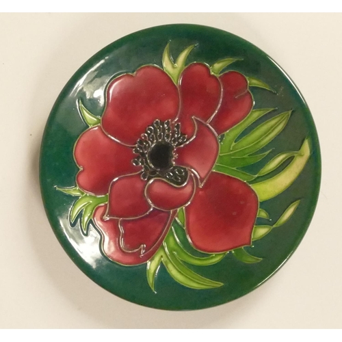 188 - A Moorcroft plate, cobalt blue and green glaze, with red poppy flower detail, signed and dated 2002 ... 