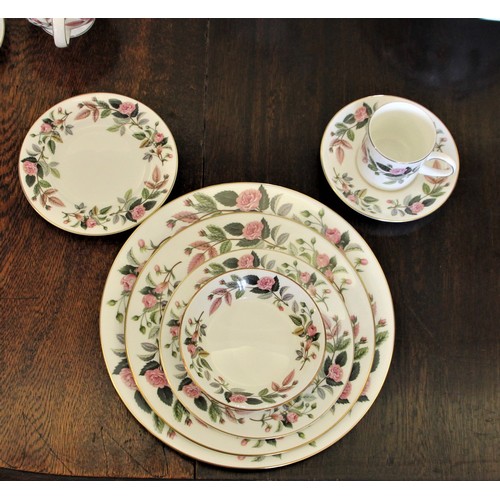 193 - A Wedgwood Hathaway Rose dinner and tea service for eight place settings, comprising   dinner plates... 