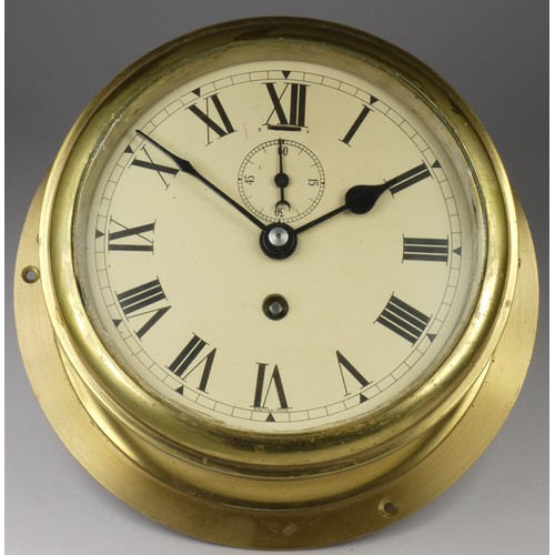 206 - An F.W. Elliott Ltd of Croydon brass bulkhead clock, with twist off bezel, the 5 1/2