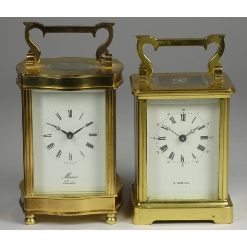 214 - A brass ogee carriage clock, the enamel dial signed Manis, London, the movement signed Fema, London,... 