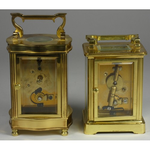 214 - A brass ogee carriage clock, the enamel dial signed Manis, London, the movement signed Fema, London,... 