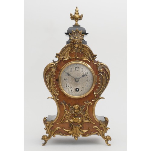 218 - A German Lenzkirch Louis XVI style burr walnut and ebonised mantle clock, with gilt applied decorati... 