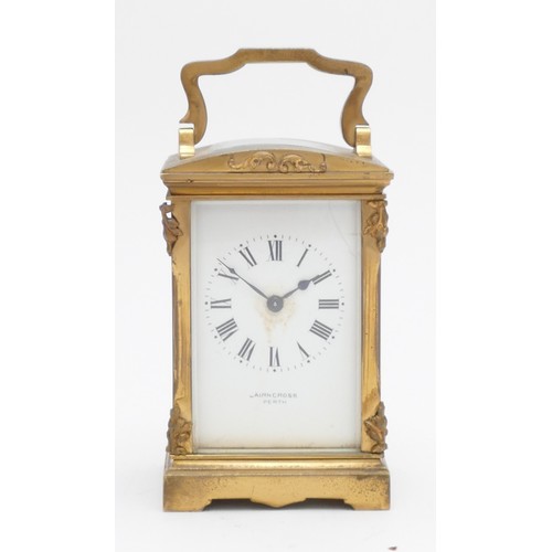 219 - A brass carriage timepiece, the white enamel dial signed Cairncross Perth, ornate case, 12 x 8 x 6.5... 