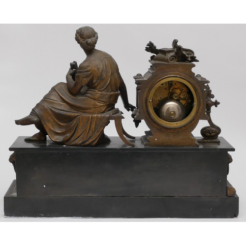 220 - An Victorian onyx mantle clock, with a spelter figure of a lady reading, 34 x 42cm.