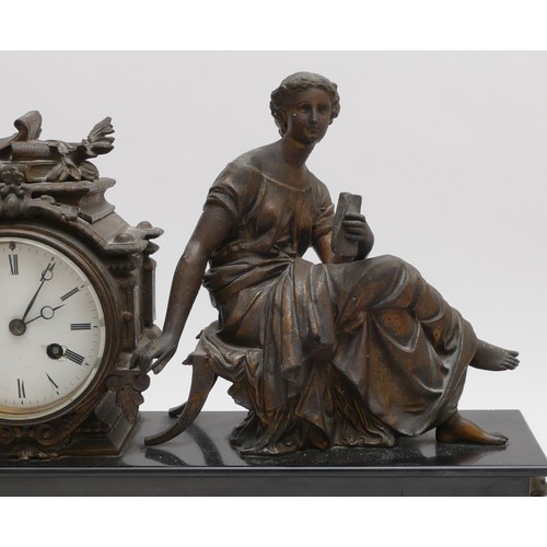 220 - An Victorian onyx mantle clock, with a spelter figure of a lady reading, 34 x 42cm.