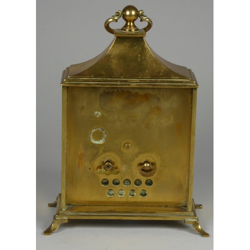 221 - A Junghans Meister brass mantle clock, decorated with a floral design, the silver chapter ring with ... 