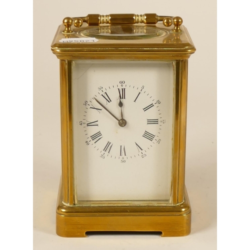 230 - A brass striking carriage clock, white enamel dial with Roman numerals, the movement signed Aiguille... 