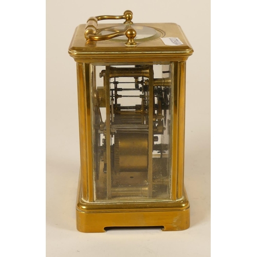 230 - A brass striking carriage clock, white enamel dial with Roman numerals, the movement signed Aiguille... 