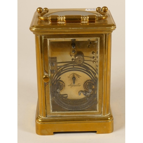 230 - A brass striking carriage clock, white enamel dial with Roman numerals, the movement signed Aiguille... 