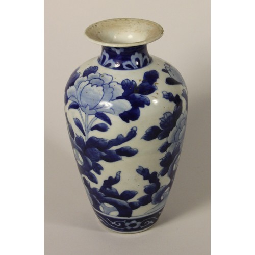 203 - A Kang Si earthenware blue and white baluster vase, 4 character mark, decorated with two panels of v... 