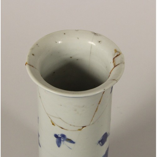 201 - A Kang Si blue and white brush pot, four character marks to base, decorated with butterflies and fol... 