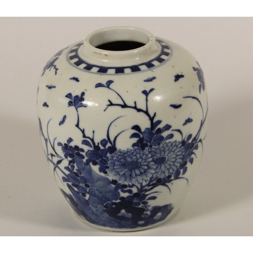 201 - A Kang Si blue and white brush pot, four character marks to base, decorated with butterflies and fol... 