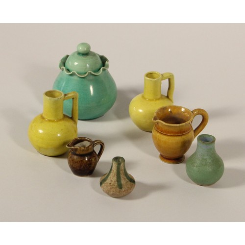 195 - A collection of seven 19th century miniature jugs and vases, 3 - 6 cm