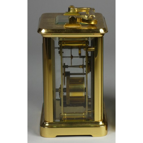 212 - A brass carriage clock, the white enamel dial signed Mappin and Webb Ltd, Roman numerals, the 11 jew... 