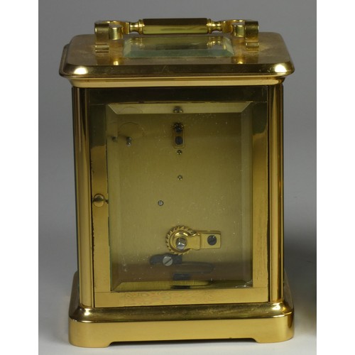 212 - A brass carriage clock, the white enamel dial signed Mappin and Webb Ltd, Roman numerals, the 11 jew... 