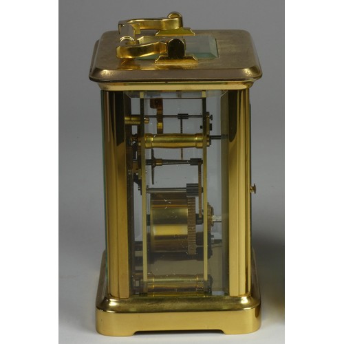 212 - A brass carriage clock, the white enamel dial signed Mappin and Webb Ltd, Roman numerals, the 11 jew... 