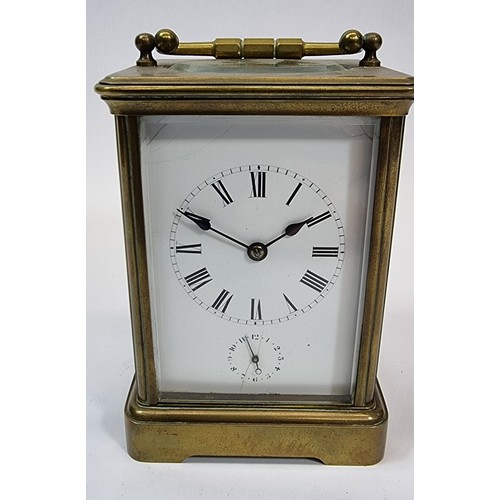 237 - A French 19th century alarm carriage clock, the white enamel dial with subsidiary alarm dial, the mo... 