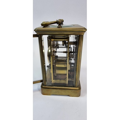 237 - A French 19th century alarm carriage clock, the white enamel dial with subsidiary alarm dial, the mo... 