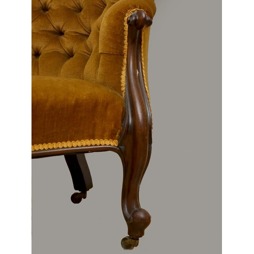 243 - A Victorian mahogany chaise longue, with serpentine front, raised on cabriole legs with brass caster... 