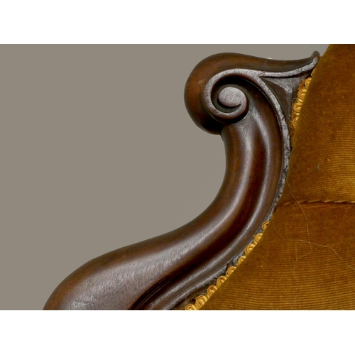 243 - A Victorian mahogany chaise longue, with serpentine front, raised on cabriole legs with brass caster... 