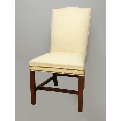 259 - A set of six upholstered mahogany dining chairs, the pair of carvers with sweeping arms, together wi... 